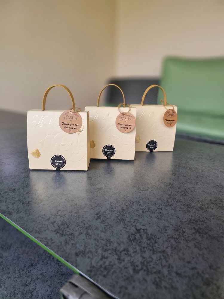 Three SASHA gift bags ready to be given