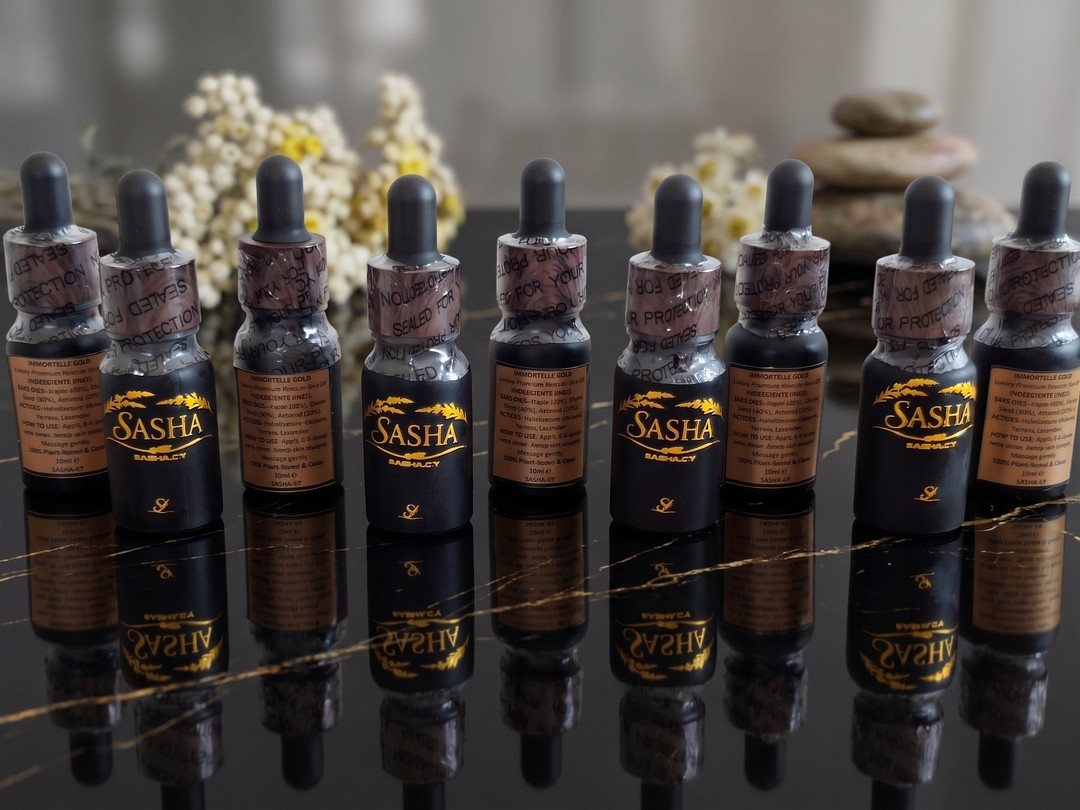 A row of Immortelle Gold bottles fresh from production